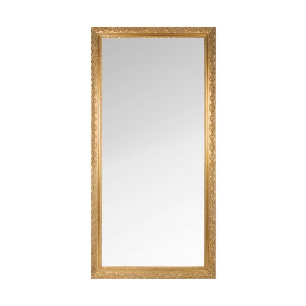Miroir avec cadre doré et décorations sculptées